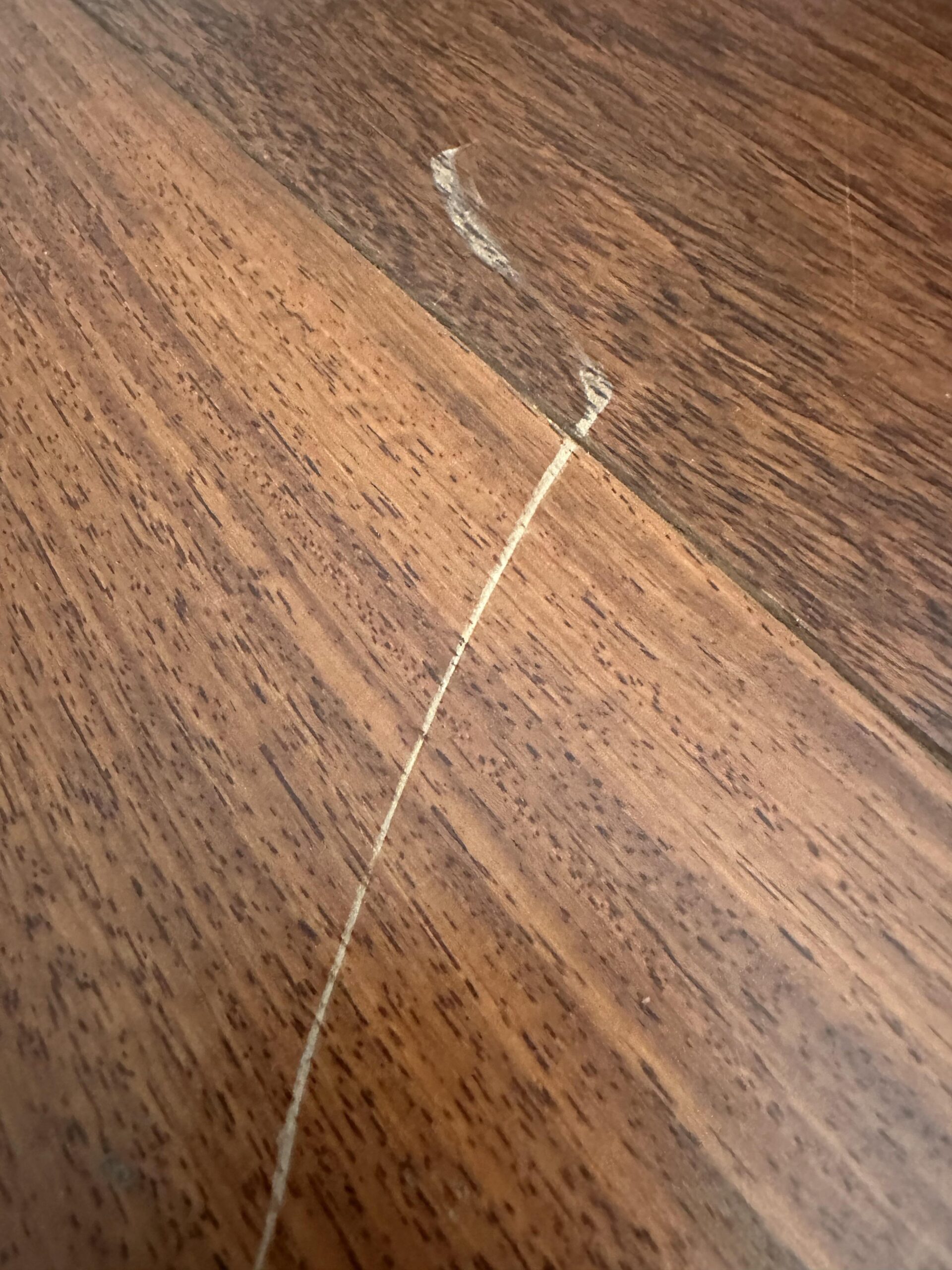 How to Get a Scratch Out of Hardwood Floor